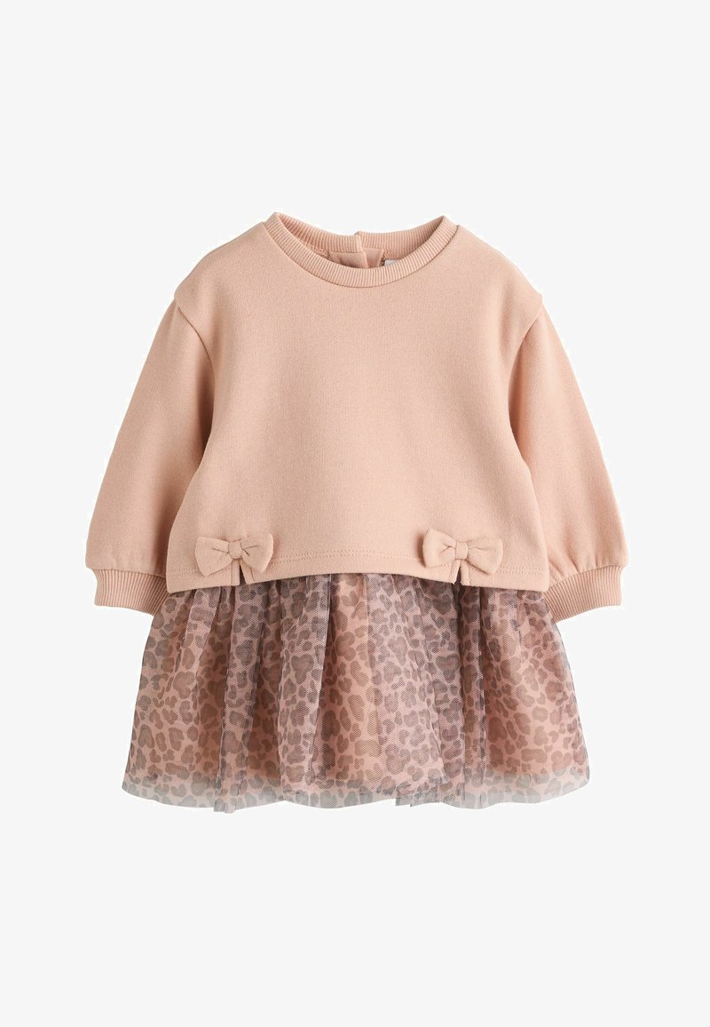 Robe rose pâle à manches longues avec poignets côtelés, deux petits nœuds à la taille et une surjupe en tulle imprimé léopard.