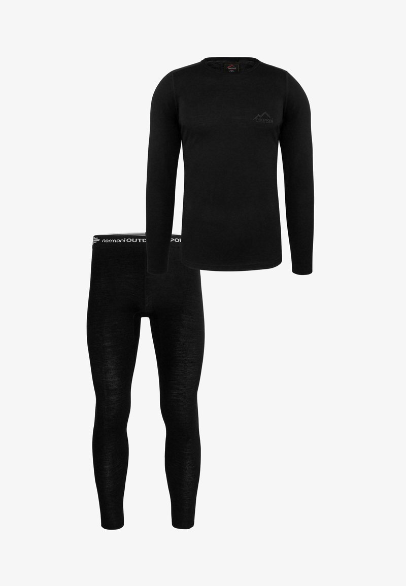 Schwarzes Langarmoberteil und passende Leggings aus einem glatten, elastischen Material. Das Oberteil hat ein kleines Logo; der Bund hat einen Text.