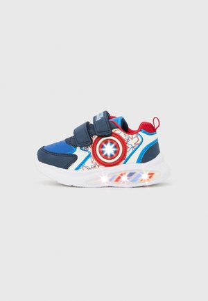 Children's sneaker in blue, red, and white with double Velcro straps, Captain America shield design, and light-up sole on a plain background.