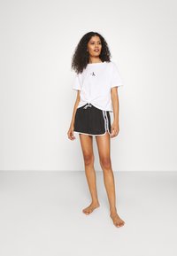Calvin Klein Swimwear CROPPED - Maglia del pigiama - classic white