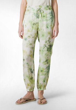 Lightweight, loose-fitting pants with a drawstring waist, featuring a watercolor floral pattern in various shades of green. Elastic cuffs at the ankles.
