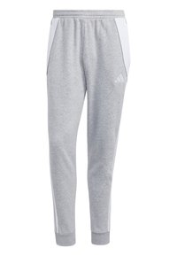 Pantalon de survêtement gris avec une taille à cordon, des panneaux latéraux blancs et le logo Adidas sur la cuisse gauche. Les poignets sont élastiqués.