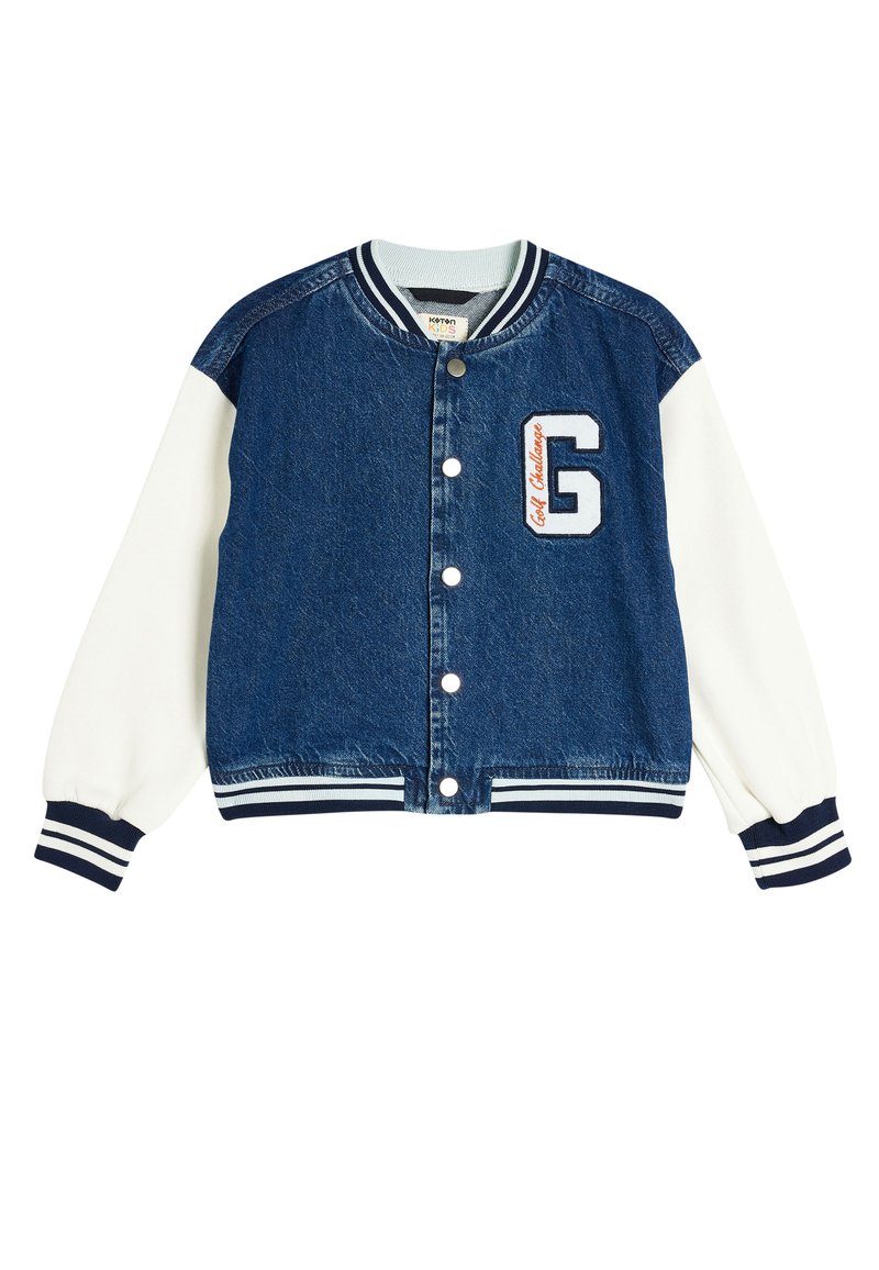 Jeansjacka med vita ärmar, ribbade muddar och nederkant. Har en broderad "G"-logotyp och texten "Golf Challenge" på bröstet.