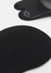 Black silicone and fabric padding inserts, featuring a smooth texture, contoured shape, with size indication printed on one piece.