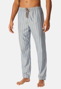 Lichtblauwe gestreepte pyjamabroek met een trekkoord in de taille en een relaxed fit. De stof lijkt zacht met een gladde textuur.