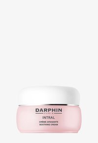 Krem kojący Darphin Intral w jasno różowym słoiczku z białą pokrywką. Na etykiecie w czarnym kolorze znajduje się nazwa produktu i marka.