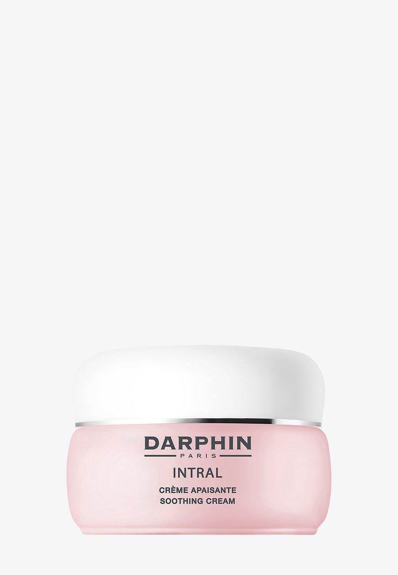 Krem kojący Darphin Intral w jasno różowym słoiczku z białą pokrywką. Na etykiecie w czarnym kolorze znajduje się nazwa produktu i marka.
