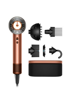 Asciugacapelli con manico in rame, testa circolare trasparente, pulsanti di accensione, cinque accessori neri intercambiabili per lo styling e custodia nera per riporlo.