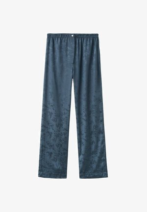 Mörkblå pyjamasbyxor med ett blommönster, elastisk midja och lös passform. Materialet ser slätt ut med en lätt glans.