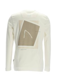 Cremefarbenes Sweatshirt mit langen Ärmeln und einem geometrischen beigefarbenen Grafikdesign auf der Rückseite. Hergestellt aus weichem, strukturiertem Stoff.