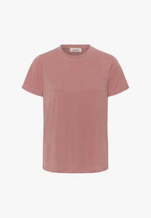 Støvet lyserød kortærmet t-shirt med rund halsudskæring og et lille "soaked" mærke indeni kraven, vist på en hvid baggrund.