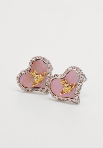 Pink heart-shaped earrings with iridescent inlay, bordered by a row of pink crystals, featuring gold accents of a crown and planet design.