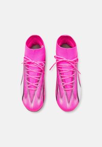 Puma Botines de fútbol para terreno firme - pink