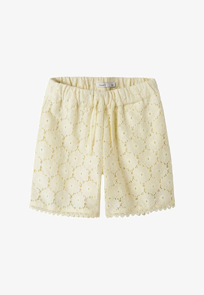 Cremefarbene Shorts mit floralem Spitzenmuster, elastischem Bund und gewelltem Saum, Größe 7-8 Jahre.