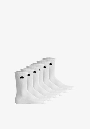 Sieben Paare weiße Sportsocken mit gerippten Bündchen und einem kleinen schwarzen Logo nahe dem oberen Rand, nebeneinander auf einem weißen Hintergrund angeordnet.