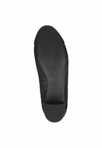 Suola di scarpa nera con superficie texturizzata, tacco liscio e base in gomma flessibile con una trama per una migliore aderenza.