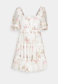 Robe à corsage smocké blanc à motifs floraux, avec bretelles à volants, manches bouffantes et jupe à volants ornée de motifs floraux roses et verts.