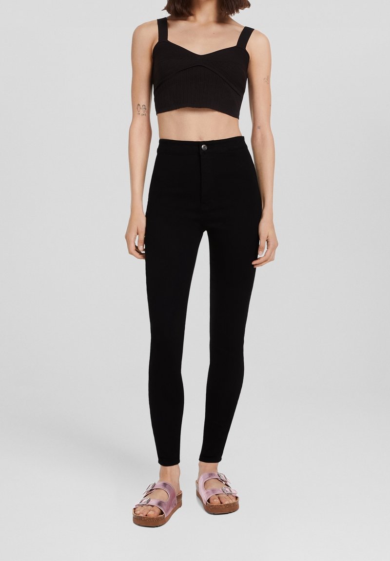 Bershka Slim fit jeans black (Pre-owned) Zalando