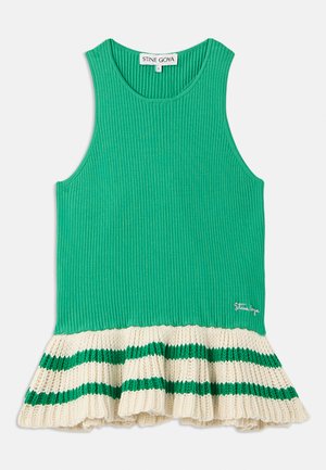 Débardeur vert à côtes avec un ourlet en tricot crème évasé présentant des rayures vertes. Logo cousu à l'avant près de l'ourlet.
