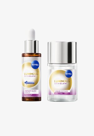 NIVEA Luminous Skin Glow set, featuring a brown glass serum bottle with dropper, and a clear liquid refiner jar with silver lid.