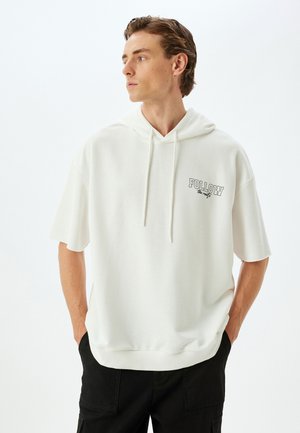 White hoodie with short sleeves and a drawstring hood. Features a small printed "FOLLOW" text on the chest. Soft fabric and relaxed fit.