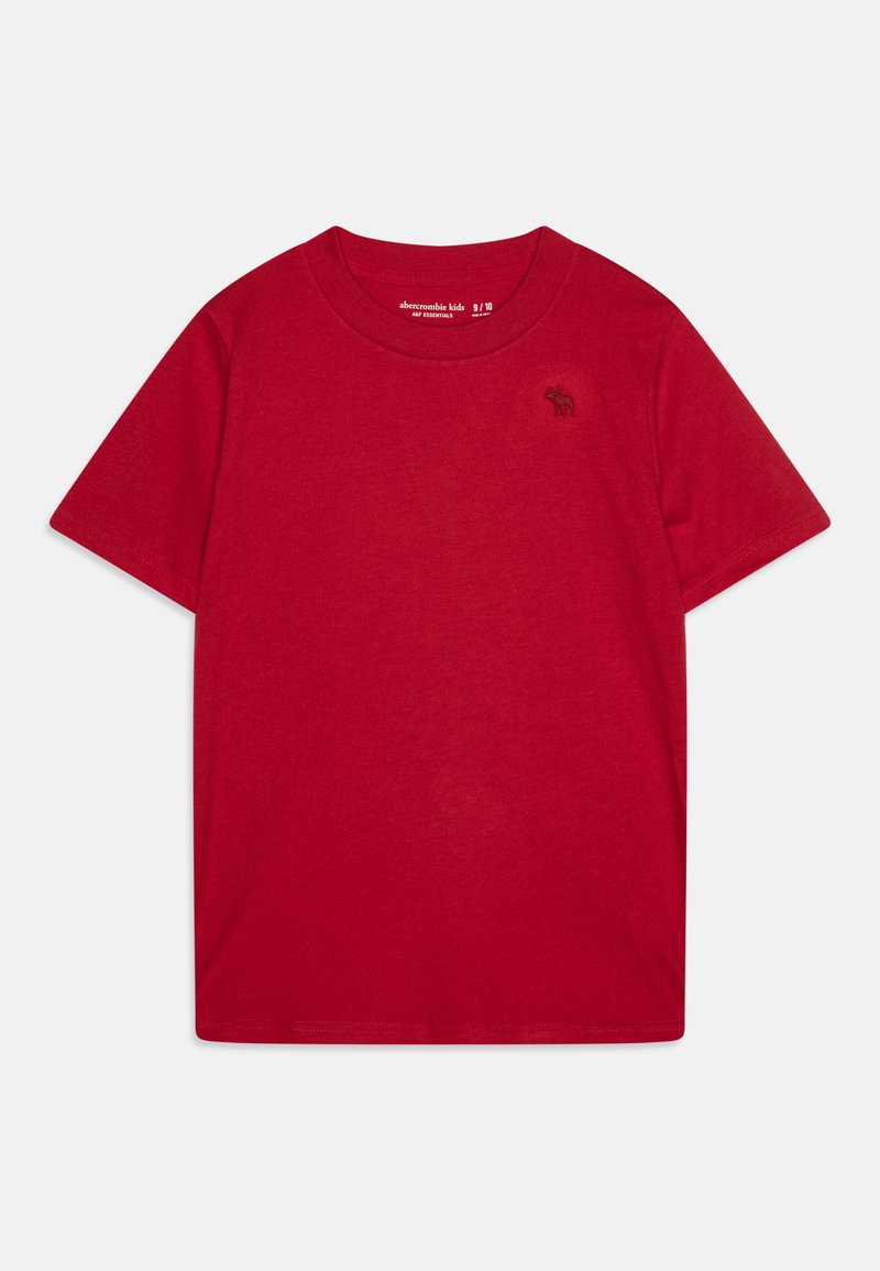T-shirt rossa in cotone con maniche corte, colletto rotondo e piccolo logo nero sul lato sinistro del petto. Tessuto morbido e leggero con una texture liscia.