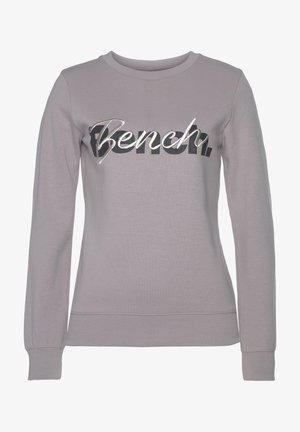 Hellgrauer Sweatshirt aus weichem Stoff, mit einem auffälligen schwarzen und silbernen "Bench"-Logo in einer Mischung aus Schriftarten. Lange Ärmel und gerippte Bündchen.