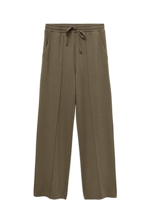 Olijfgroene wijde broek, gemaakt van zachte stof. Voorzien van een elastische tailleband met een trekkoord en zijzakken. Gladde textuur.
