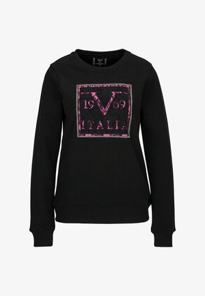 Sweat-shirt noir à manches longues avec un graphique carré rose et noir sur la poitrine, comportant le texte "V 1969 ITALIA" et des motifs décoratifs.