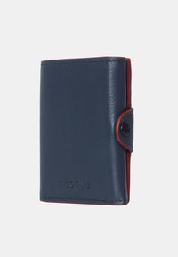 Navy blue leather wallet with a smooth texture, red interior accents, snap button closure, and embossed brand logo on the front.