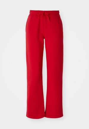 Røde stretch bomullssweatpants med bred ben-design, elastisk midje og snøring. Har sidelommer og en glatt tekstur.