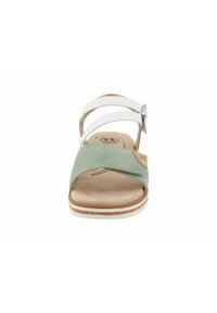 Green suede and white leather sandal featuring two crossover straps, adjustable buckle, and a natural cork sole with white stripes.