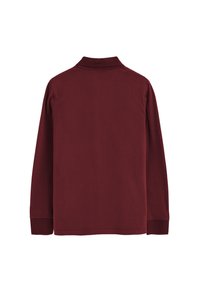 Langärmliges Polohemd in tiefem Burgunderrot, mit klassischem Kragen, geradem Saum und gerippten Bündchen. Weiche Textur mit glatter Oberfläche.