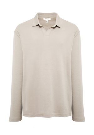 Light beige long-sleeve polo shirt with a relaxed fit, featuring a ribbed collar, subtle texture, and a v-neck design. No visible fastenings.