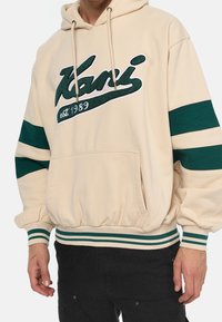 Karl Kani Jersey con capucha - beige