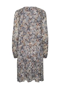 Kwiatowa sukienka z lekkiego, przezroczystego materiału z długimi rękawami. Posiada szary tło, brązowe i białe kwiaty oraz falbaniaste wykończenie spódnicy.