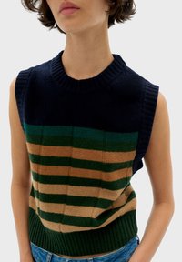 Knit sleeveless sweater featuring a ribbed collar, horizontal stripes in dark blue, green, and beige, with a textured finish and fitted hem.