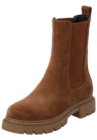 Botte cheville en suède marron avec des panneaux élastiques sur les côtés, bout arrondi et semelle en caoutchouc épaisse dotée d'un motif de bande de roulement texturé.