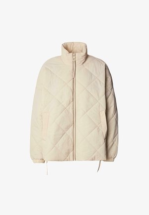 Quiltet beige jakke med høj krave, frontlynlås og elastiske manchetter. Har skrå syninger og to sidelommer. Letvægtsstof.