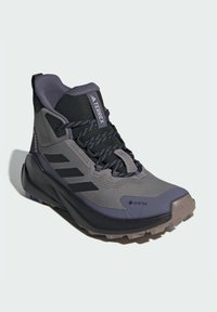 Běžecké boty do terénu - taupe oxide core black preloved violet