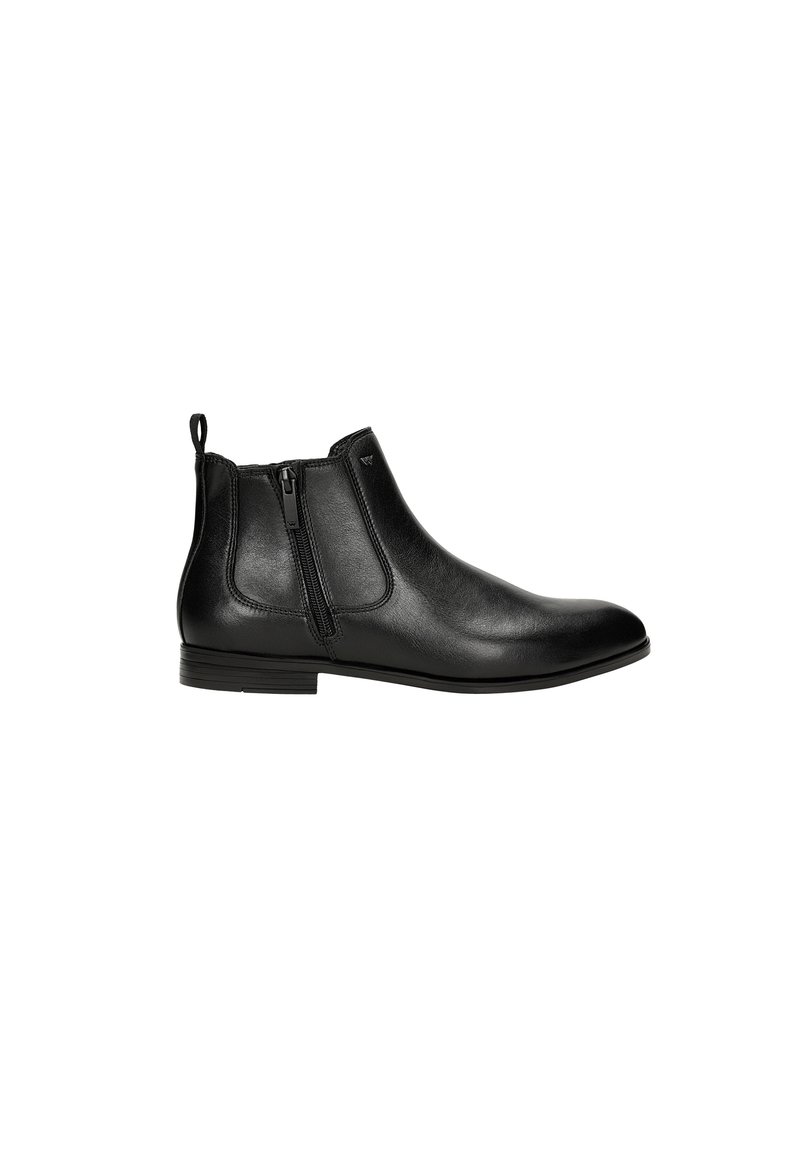 Schwarze Leder-Stiefeletten verfügen über eine glatte Oberfläche, einen niedrigen Blockabsatz, doppelte seitliche Reißverschlüsse und eine Zuglasche an der Rückseite für ein einfaches Anziehen.