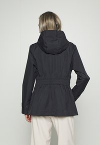 Athleta SUTRO RAINOUT - Casaco impermeável - black