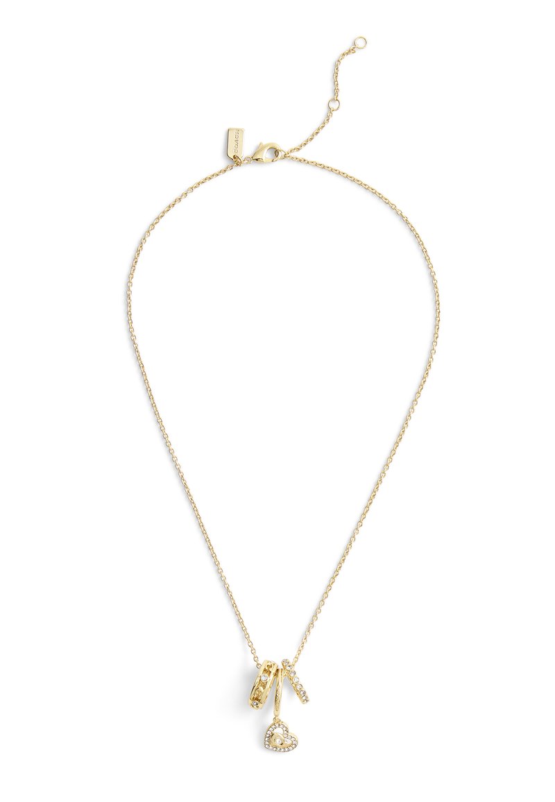 Gold-tone necklace with a delicate chain, featuring three pendants: two rings and a heart shape adorned with clear stones.