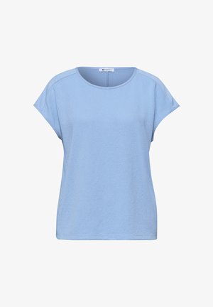 Haut pour femme bleu clair à manches courtes, col rond et coupe ample, fabriqué en tissu texturé.