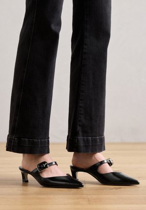 Heeled mules - black