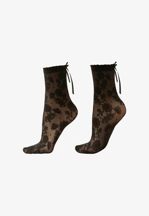 Zwarte bloemenkant enkel sokken met een geschulpte bovenkant en lintdetail, met een doorschijnende textuur en een bloemenpatroon over de hele sok.