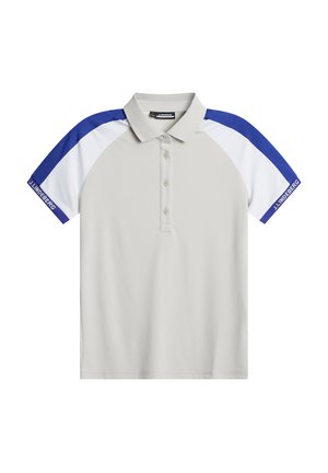 Polo léger gris avec manches raglan courtes, accents bleu et blanc, patte de boutonnage à trois boutons et logo "J.Lindeberg" sur la manche.