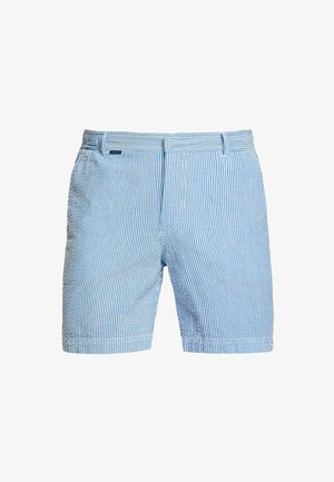 Shorts rayés bleu et blanc en tissu léger avec un devant plat, des passants de ceinture et des poches latérales. Coupe droite avec bords ourlés.
