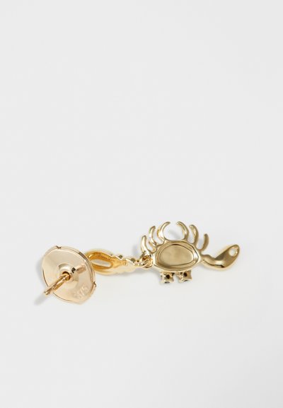 Gold crab-shaped earring with a polished surface, featuring detailed claws and a smooth body. Metal stud back ensures secure wear.