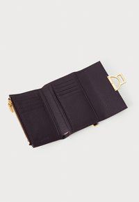 Black leather wallet opened, featuring card slots, a zippered compartment, and gold-tone hardware. Textured exterior with stitching details.